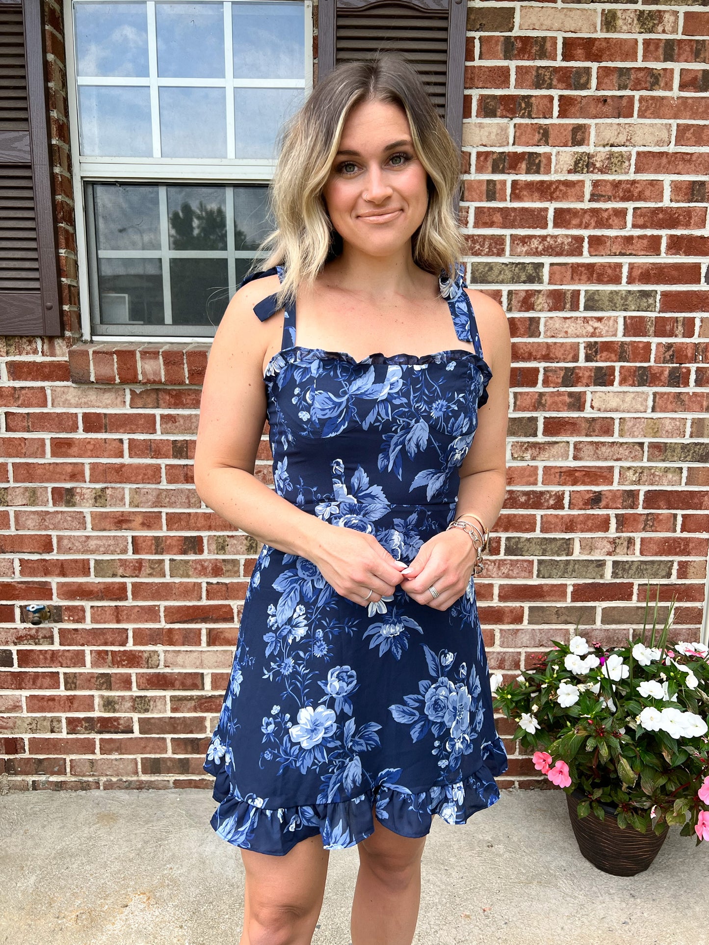 blue floral mini dress with adjustable straps - close up